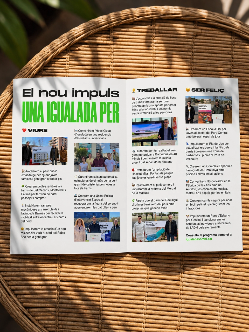 Open El Nou Impuls campaign leaflet on a rattan table.
