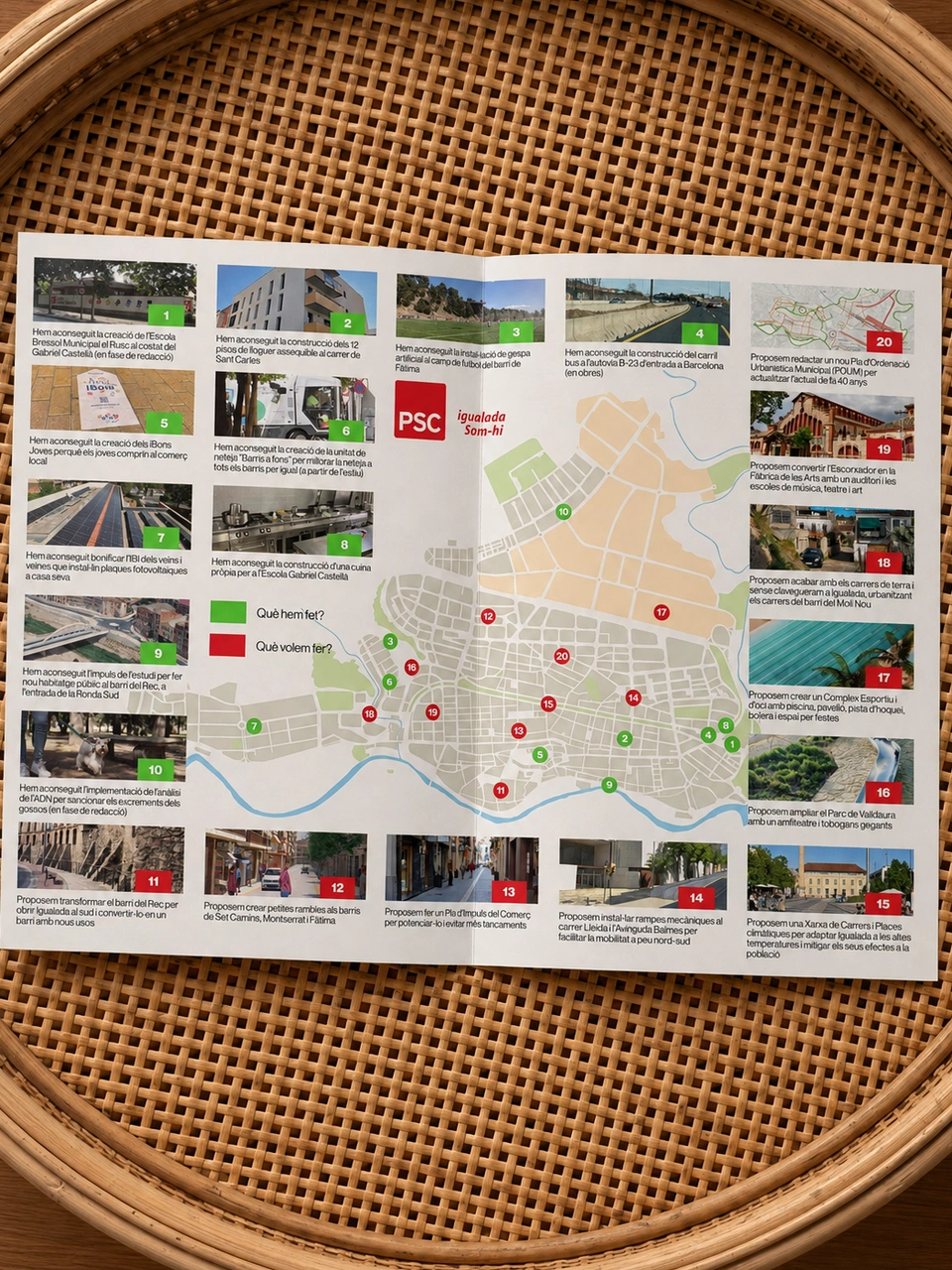 Open leaflet on a rattan table showing a map of Igualada with local initiatives and proposals.