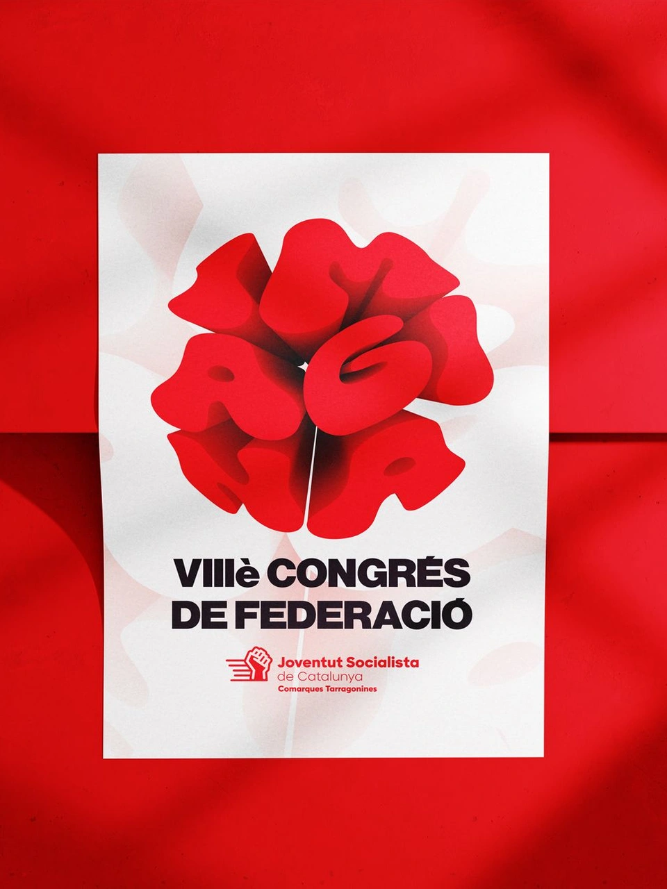 Imagina congress poster on a red wall, featuring the flower-shaped lettering.