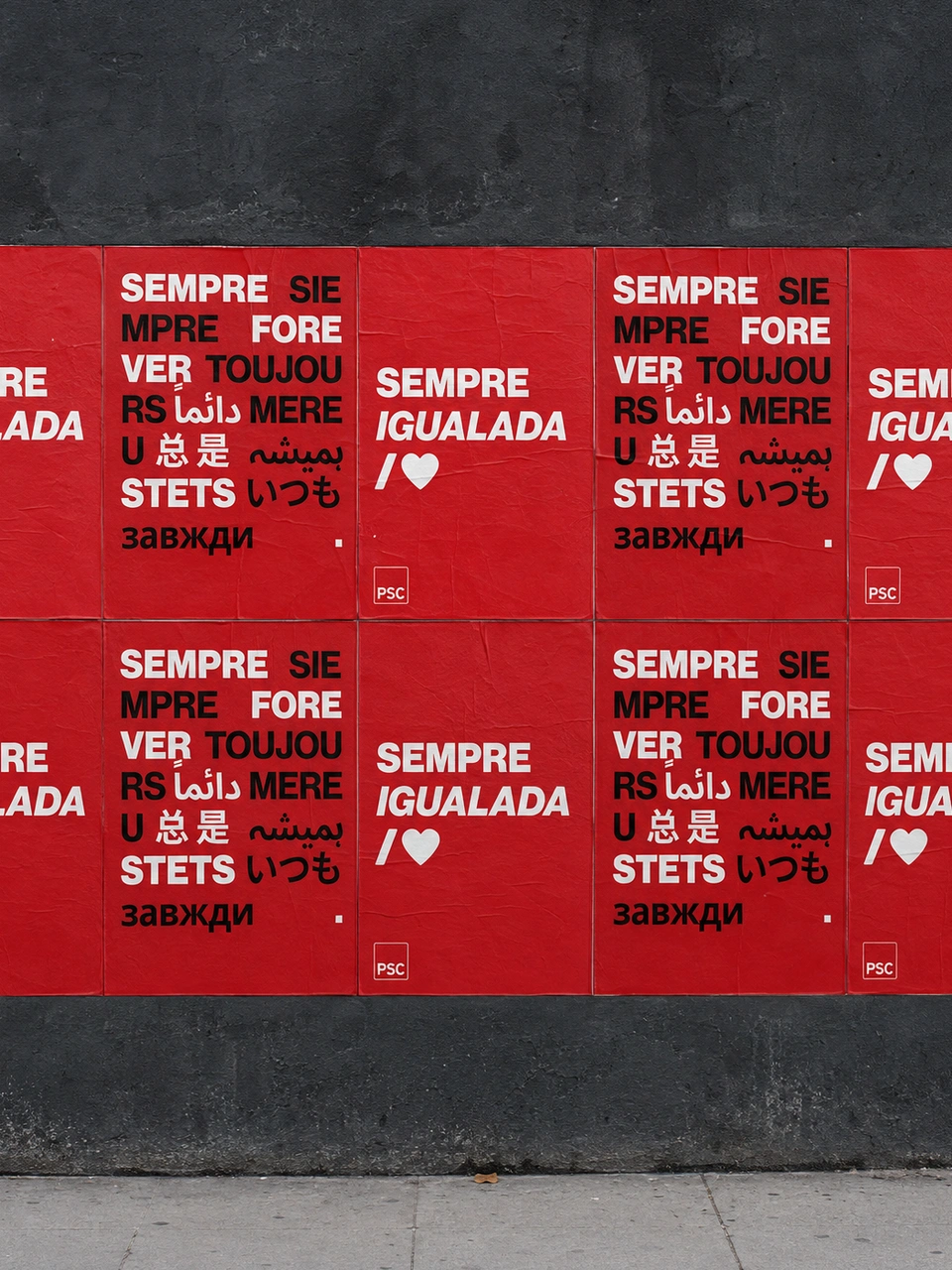 Street wall mockup with two rows of alternating Sempre Igualada and multilingual red posters.